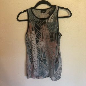 Colorful sleeveless shirt with detailing.
